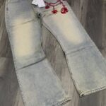 Black Distressed Bootcut Jeans With Graphic