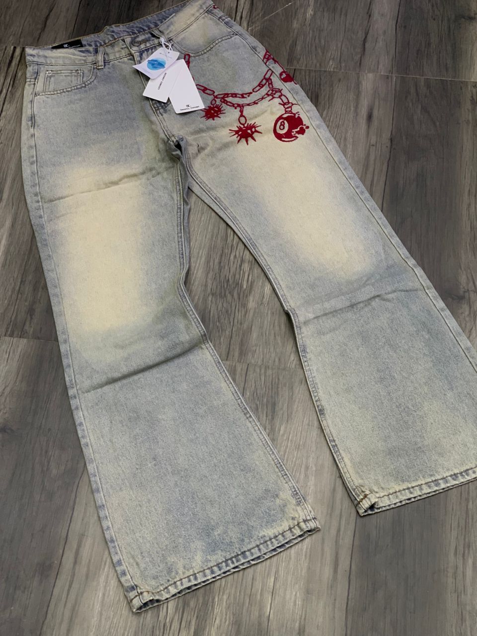 Black Distressed Bootcut Jeans With Graphic